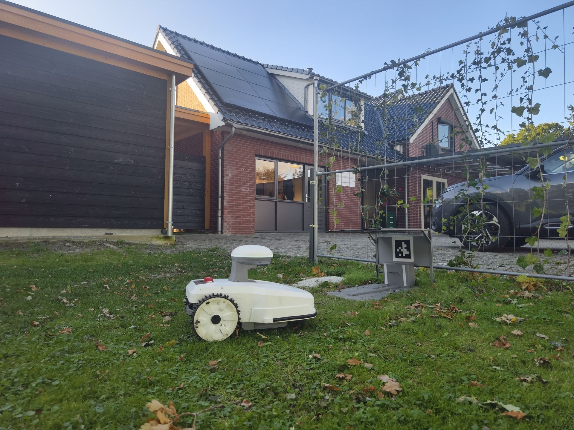 Homeowner with robotic mower